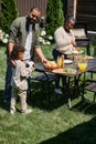 cheerful african american parents serving table Royalty Free Stock Photo