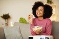 Cheerful African American Woman Enjoying Movie Snacking Eating Popcorn Indoor Royalty Free Stock Photo