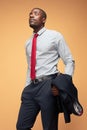Cheerful african businessman posing at studio Royalty Free Stock Photo