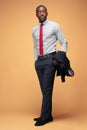 Cheerful african businessman posing at studio Royalty Free Stock Photo