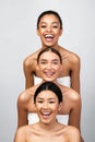 Cheerful Mixed Girls Posing Wrapped In Bath Towels, Gray Background Royalty Free Stock Photo