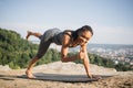 Cheerful african woman doing morning exercise outdoors Royalty Free Stock Photo