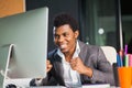 Cheerful afro american man look happy at monitor successful entrepreneur Royalty Free Stock Photo