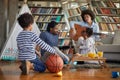 Cheerful afro american parents playing with their kids Royalty Free Stock Photo