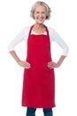 Cheerful aged confident female chef