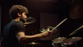 Cheerful artist hitting drum cymbals in studio. Closeup drummer playing on stage Royalty Free Stock Photo