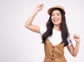 Cheerful Asian girl celebrating a special day, jumps and raise arms with energy Royalty Free Stock Photo