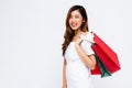 Cheerful Asian lady with paper bags