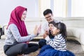 Cheerful muslim family clapping hands playfully Royalty Free Stock Photo