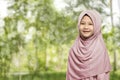 Cheerful asian muslim woman wearing hijab standing Royalty Free Stock Photo