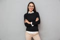 Cheerful asian woman in business clothes and eyeglasses Royalty Free Stock Photo