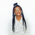Cheerful attractive black woman in glasses looking at camera Royalty Free Stock Photo