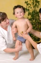 Cheerful baby at the doctor.