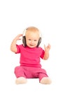 Cheerful baby listening to the music