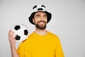 cheerful bearded football fan holding soccer Royalty Free Stock Photo