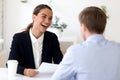 Cheerful biracial HR manager interviewing job candidate Royalty Free Stock Photo