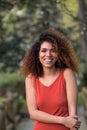 Cheerful black afro woman outdoors