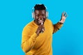 Cheerful Black Man Wearing Wireless Headphones Listening Music And Singing Royalty Free Stock Photo