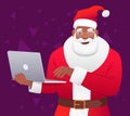 Cheerful black Santa Claus is working on a laptop. Cartoon African Santa winks at the camera. Elements for the design of a