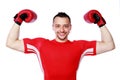 Cheerful boxer man winner raising arms