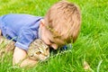 Cheerful boy hugging cat Royalty Free Stock Photo