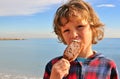 Cheerful boy with ice-cream