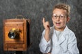 Cheerful boy retro photographer with vintage wooden camera Royalty Free Stock Photo