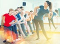 Cheerful boys and girls studying contemp dance Royalty Free Stock Photo