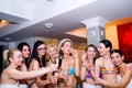 Cheerful bride and bridesmaids celebrating hen party with champa Royalty Free Stock Photo