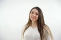 Cheerful brunette business woman student in white button up shirt, smiling confident and cheerful with arms folded Royalty Free Stock Photo