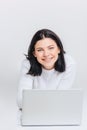 Cheerful brunette girl using laptop Royalty Free Stock Photo