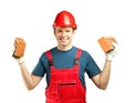 Cheerful builder holding bricks Royalty Free Stock Photo