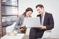 Cheerful business people using technology Royalty Free Stock Photo