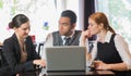 Cheerful business people working with their laptop Royalty Free Stock Photo