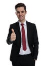 Cheerful businessman giving a thumbs up Royalty Free Stock Photo