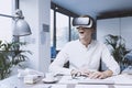 Cheerful businessman interacting with virtual reality Royalty Free Stock Photo