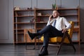 Cheerful businessman in shirt making phone call indoor Royalty Free Stock Photo