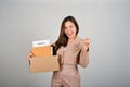 A cheerful businesswoman celebrating after quitting her job. white  background Royalty Free Stock Photo