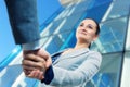 Cheerful businesswoman and client handshaking Royalty Free Stock Photo