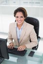 Cheerful businesswoman looking at camera Royalty Free Stock Photo
