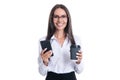 cheerful businesswoman messaging on phone in studio. businesswoman messaging on phone