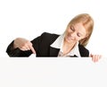 Cheerful businesswomen presenting empty board Royalty Free Stock Photo