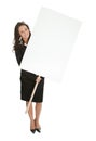 Cheerful businesswomen presenting empty board Royalty Free Stock Photo