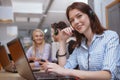 Cheerful call center operator at work Royalty Free Stock Photo