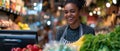 Cheerful Cashier Effortlessly Scanning Groceries With A Friendly Smile On Her Face