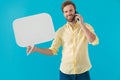 Cheerful casual man talking on his phone Royalty Free Stock Photo