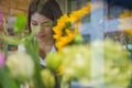 Cheerful charming young business owner flower shop store florist