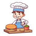 Cheerful chef cute child smiling with gourmet burger