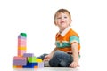 Cheerful child boy playing with construction set Royalty Free Stock Photo