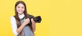 cheerful child girl take photo with digicam, photography. Child photographer with camera, horizontal poster, banner with Royalty Free Stock Photo